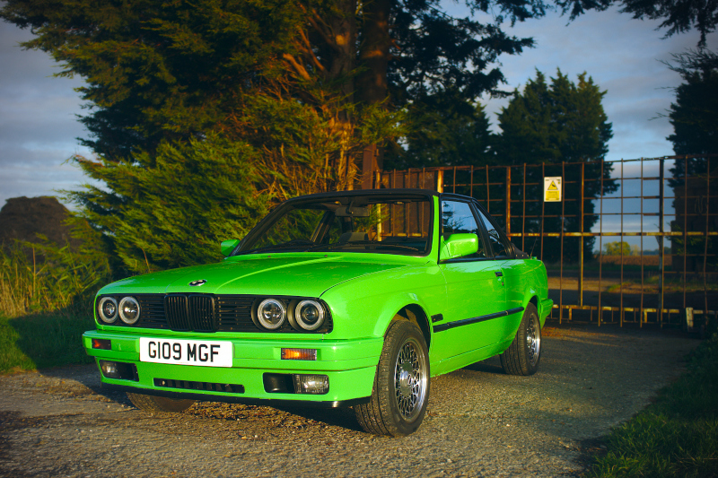 The same E30 photo, much more vivid, with a tighter crop.
